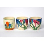 'Rudyard' two Clarice Cliff Fantasque Bizarre egg cups, painted in colours, and Clarice Cliff '