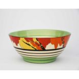 'Honolulu' a Clarice Cliff Bizarre bowl, painted in colours between black and green bands, a Clarice
