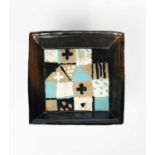 ‡ John Maltby (1936-2020)a large stoneware square plate with raised rim, painted to the well with