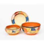 'Melon' a Clarice Cliff Fantasque Bizarre bowl, painted in colours, another bowl and a Breakfast