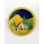 'Applique Lugano' a Clarice Cliff Fantasque Bizarre Hiawatha bowl, painted in colours inside yellow,