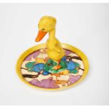 'Autumn' a Clarice Cliff Fantasque Bizarre duck egg cruet tray, painted in colours inside yellow