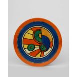 'Sliced Circle' a Clarice Cliff Fantasque Bizarre side plate, painted in colours inside blue and