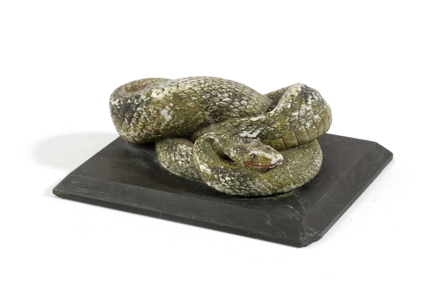 AN ITALIAN MARBLE GRAND TOUR CARVING OF A KNOTTED SNAKE EARLY 19TH CENTURY with green painted