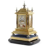 A FRENCH GILT BRASS AND PORCELAIN MOUNTED MANTEL CLOCK LATE 19TH CENTURY the brass eight day