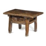 A SMALL SPANISH WALNUT AND CHESTNUT TABLE 17TH / 18TH CENTURY with a frieze drawer carved with