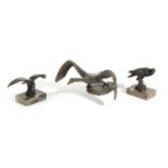 ‡ A PAIR OF CANADIAN BRONZE EAGLES BY SIGGY PUCHTA, 20TH CENTURY limited edition, one standing on