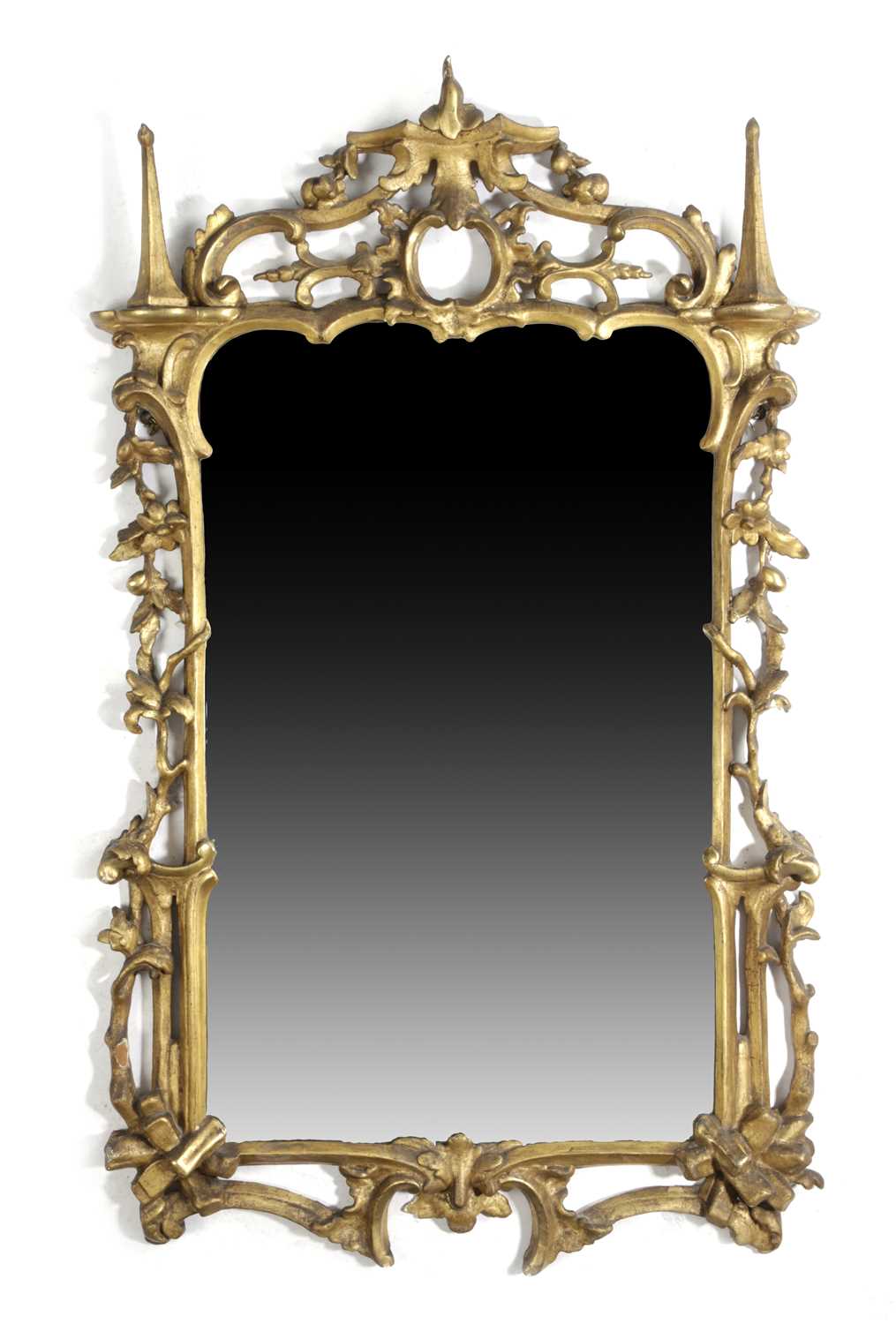 A GEORGE III GILTWOOD WALL MIRROR C.1770-80 the later plate within a naturalistically carved frame