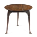 A GEORGE III OAK AND ASH CRICKET TABLE LATE 18TH CENTURY the circular top on turned club legs and