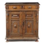 AN OAK SIDE CABINET LATE 17TH CENTURY the twin hinged top revealing a vacant interior, the front