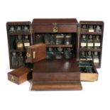 A VICTORIAN MAHOGANY CAMPAIGN STYLE APOTHECARY CABINET C.1860 the fold-out doors enclosing a