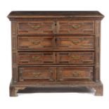 A WILLIAM AND MARY OAK CHEST LATE 17TH CENTURY of four long drawers with geometric moulded fronts