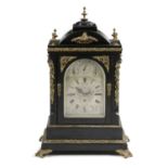 A VICTORIAN EBONISED CHIMING BRACKET CLOCK RETAILED BY BY J.W. CLARKE, C.1870-80 the brass three