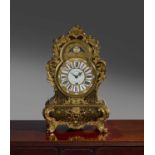 A ROYAL LOUIS XV BOULLE AND ORMOLU MOUNTED CLOCK AND STAND C.1730 AND LATER the brass eight day twin
