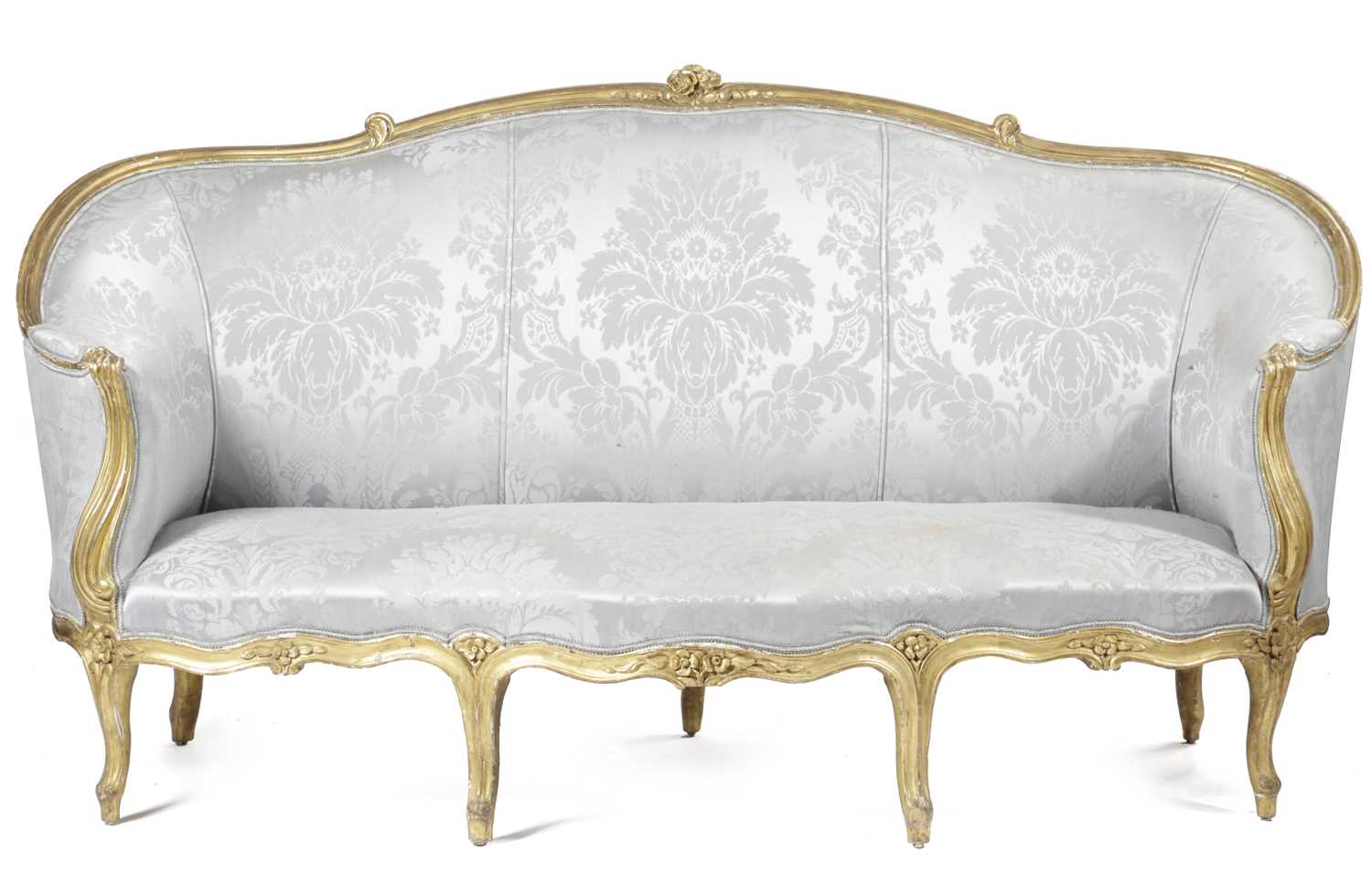 A FRENCH GILTWOOD CANAPE IN LOUIS XV STYLE, 19TH CENTURY the moulded frame carved with flowers and