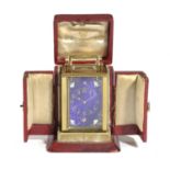 A FRENCH GILT BRASS AND ENAMEL MINIATURE CARRIAGE CLOCK 19TH CENTURY the brass eight day movement