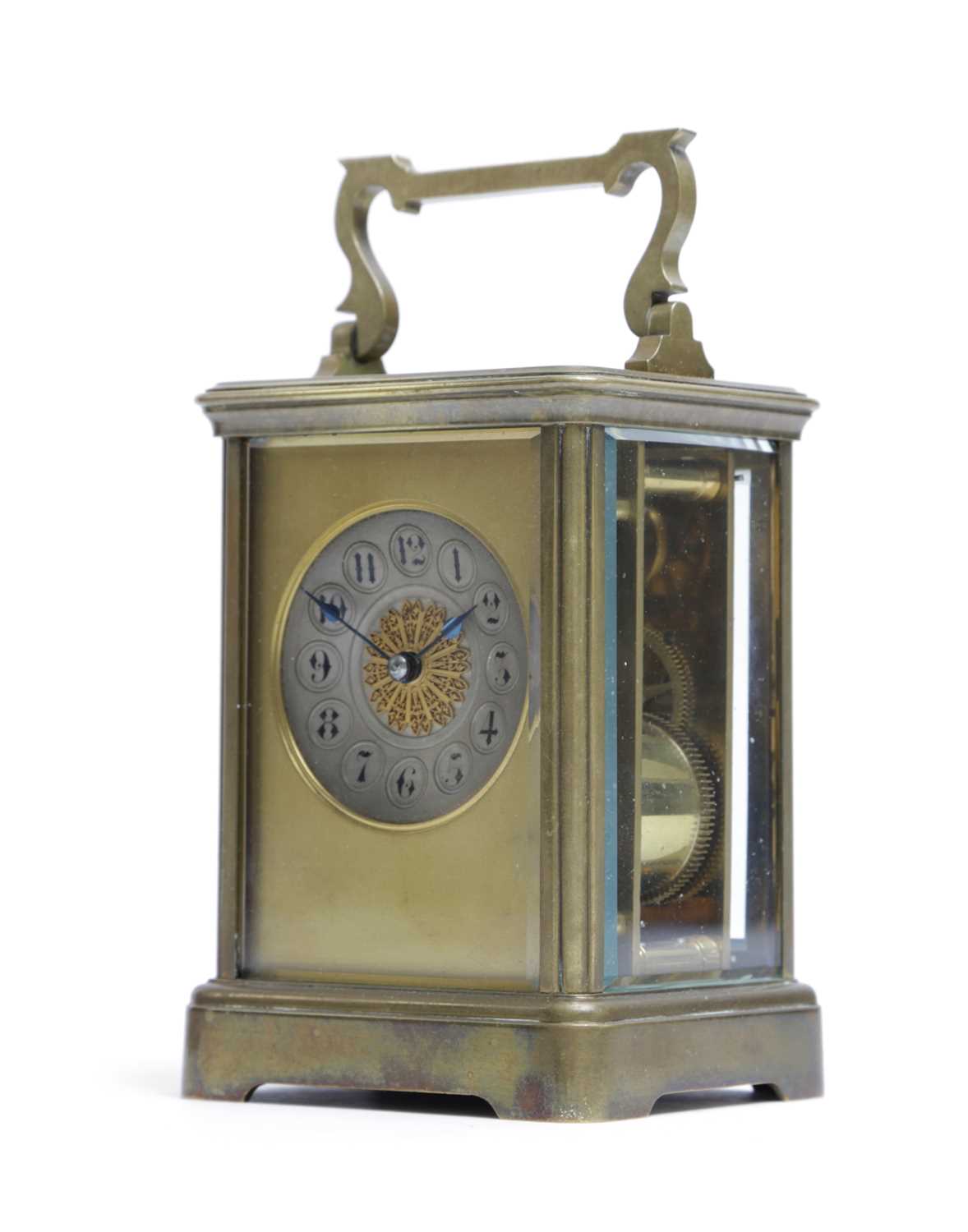 A FRENCH GILT BRASS CARRIAGE CLOCK LATE 19TH CENTURY the brass eight day movement with a platform