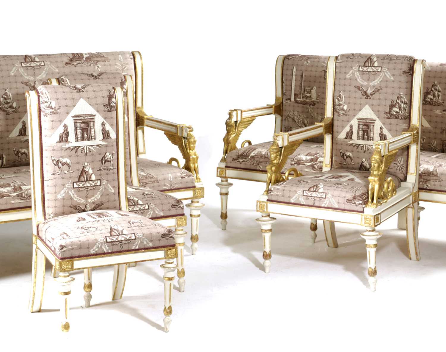 AN ITALIAN PAINTED AND PARCEL GILT SALON SUITE IN EGYPTIAN REVIVAL STYLE, LATE 19TH / EARLY 20TH