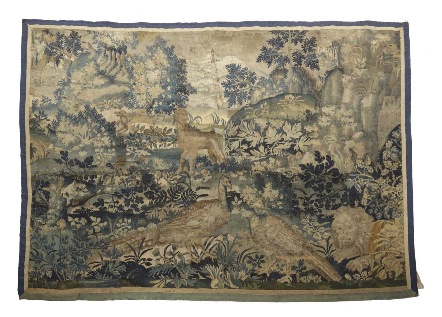 A FLEMISH VERDURE TAPESTRY 17TH CENTURY woven in silk and wool, depicting pheasants and wild
