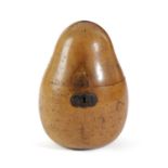 A TREEN FRUITWOOD TEA CADDY IN THE FORM OF A PEAR EARLY 19TH CENTURY with a shaped oval