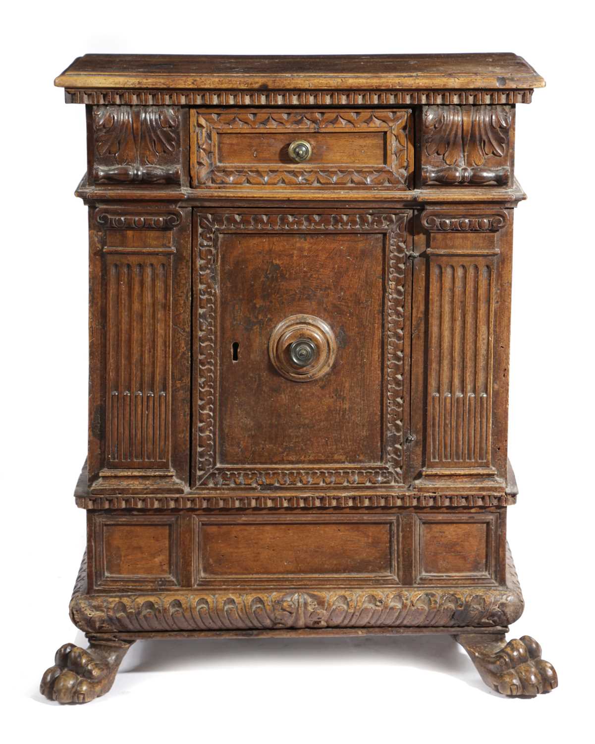 AN ITALIAN WALNUT SIDE CABINET TUSCAN, 17TH CENTURY with a pair of architectural pilasters