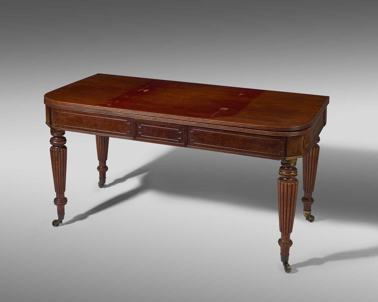 A RARE GEORGE IV MAHOGANY CAMPAIGN DINING TABLE BY CHARLES STEWART, LONDON, C.1820 with brass