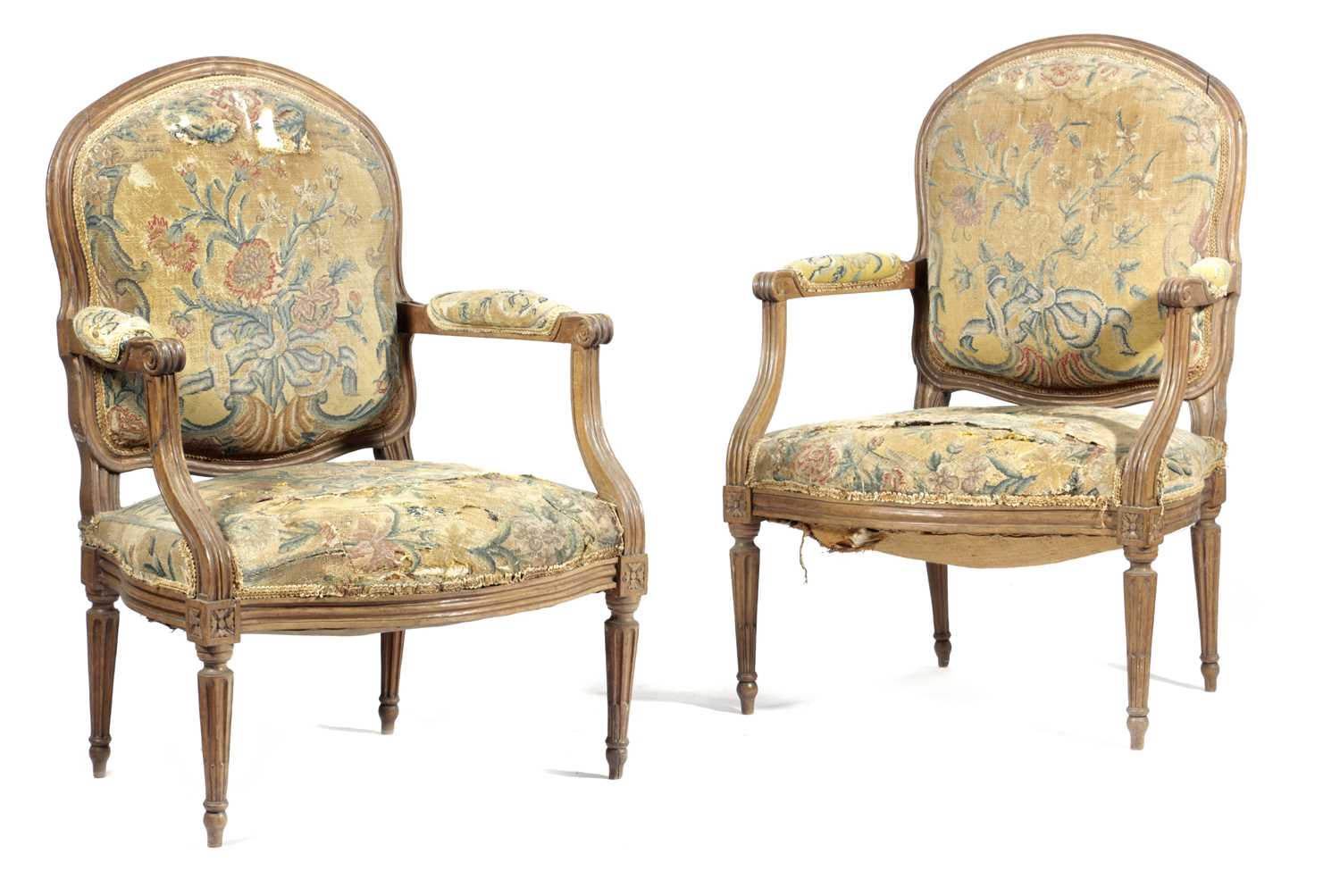 A PAIR OF FRENCH BEECHWOOD FAUTEUIL IN LOUIS XVI STYLE, 19TH CENTURY upholstered with floral