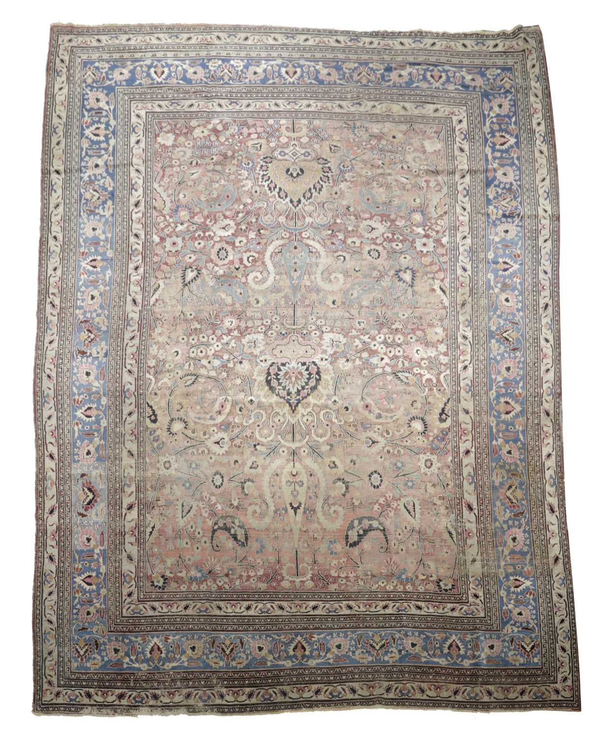 A MASHAD CARPET NORTH EAST KHORASAN, LATE 19TH CENTURY the raspberry field with flowers and vines