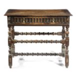 AN OAK SIDE TABLE LATE 17TH CENTURY AND LATER with applied split mouldings, the arcaded frieze