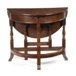 A WILLIAM AND MARY OAK BOX-TOP TABLE EARLY 18TH CENTURY the hinged demi-lune top revealing a
