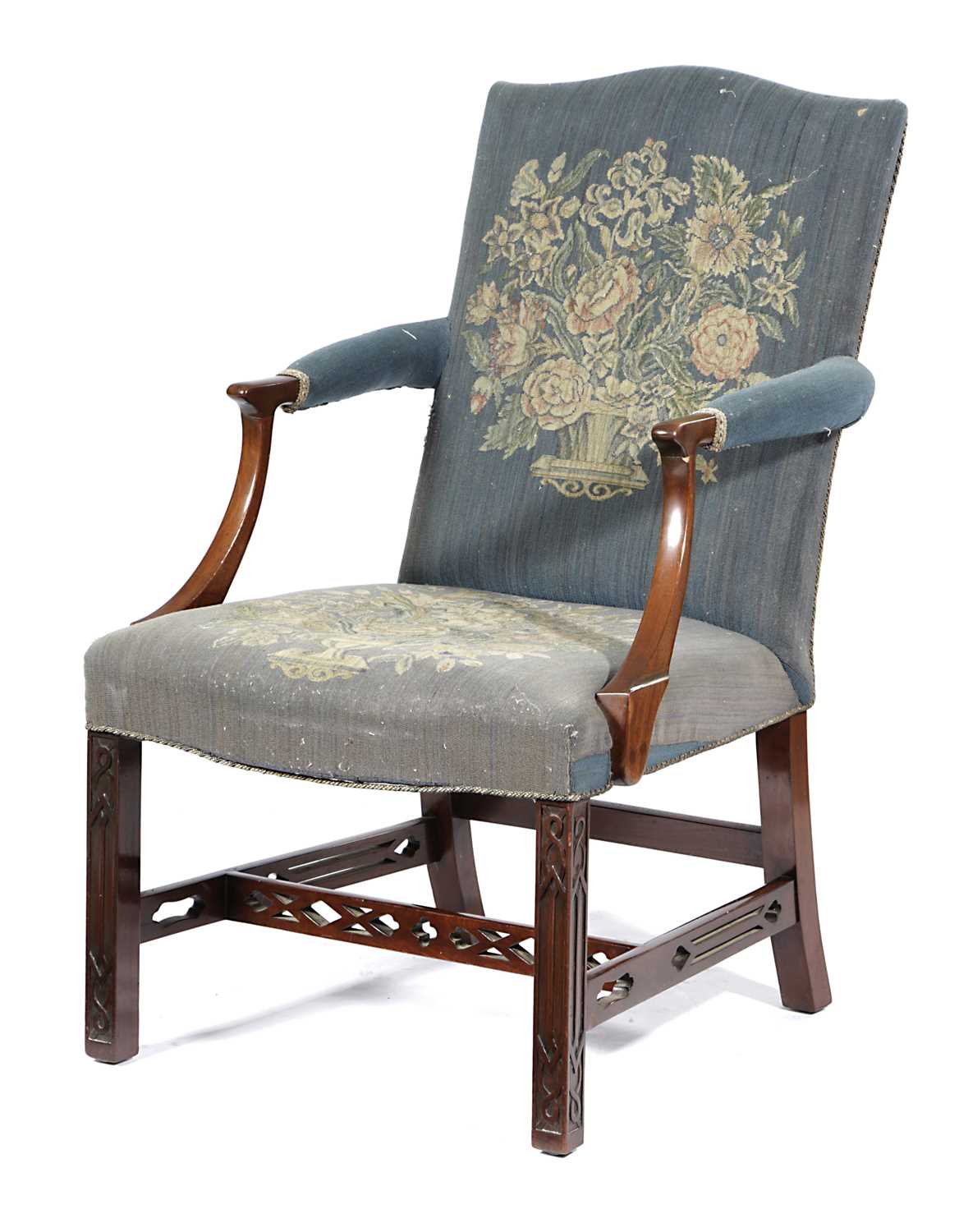 A MAHOGANY GAINSBOROUGH ARMCHAIR IN GEORGE III STYLE, LATE 19TH CENTURY with an arched back and a