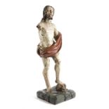 A SPANISH POLYCHROME PAINTED AND GILT FIGURE OF CHRIST LATE 16TH / EARLY 17TH CENTURY standing, with