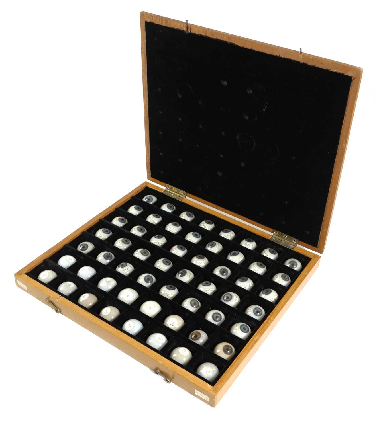 A CASED SET OF FIFTY-SIX OPTICIAN'S PROSTHETIC EYES LATE 19TH / EARLY 20TH CENTURY the irises in