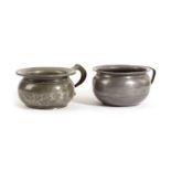 TWO PEWTER CHAMBER POTS LATE 18TH / EARLY 19TH CENTURY one inscribed 'ITIS APIS POTAN DITIS ABIGO