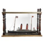 A FOLK ART CASED MODEL SHIP LATE 19TH / EARLY 20TH CENTURY the steam liner with a pair of funnels