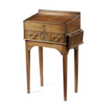 A LATE GEORGE III OAK CHILD'S DESK LATE 18TH / EARLY 19TH CENTURY the hinged top enclosing a
