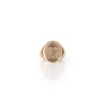 A gold signet ring, circa 1946, engraved with a crest of a greyhound beneath a tree, in 9ct gold,