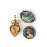 A collection of two brooches and a pendant, circa 1900, comprising: a brooch set with a turquoise