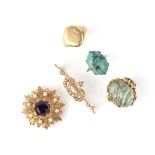 A collection of gold and gem-set jewels, comprising: a ring set with an amorphous carved aquamarine,