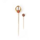 λ Two coral stick pins, mid 19th century, the first stick pin designed in the Archaeological Revival