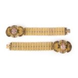 A pair of paste and gilt metal bracelets, 1830s, each centring on an oval pink paste, within a