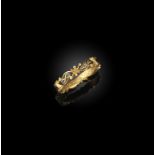 A fine gold and enamel mourning ring, circa 1761, of scrolled design, applied with black enamel,