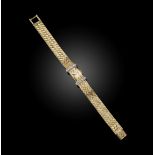 Van Cleef & Arpels, a lady's gold and diamond wristwatch, the rectangular brushed gold dial with