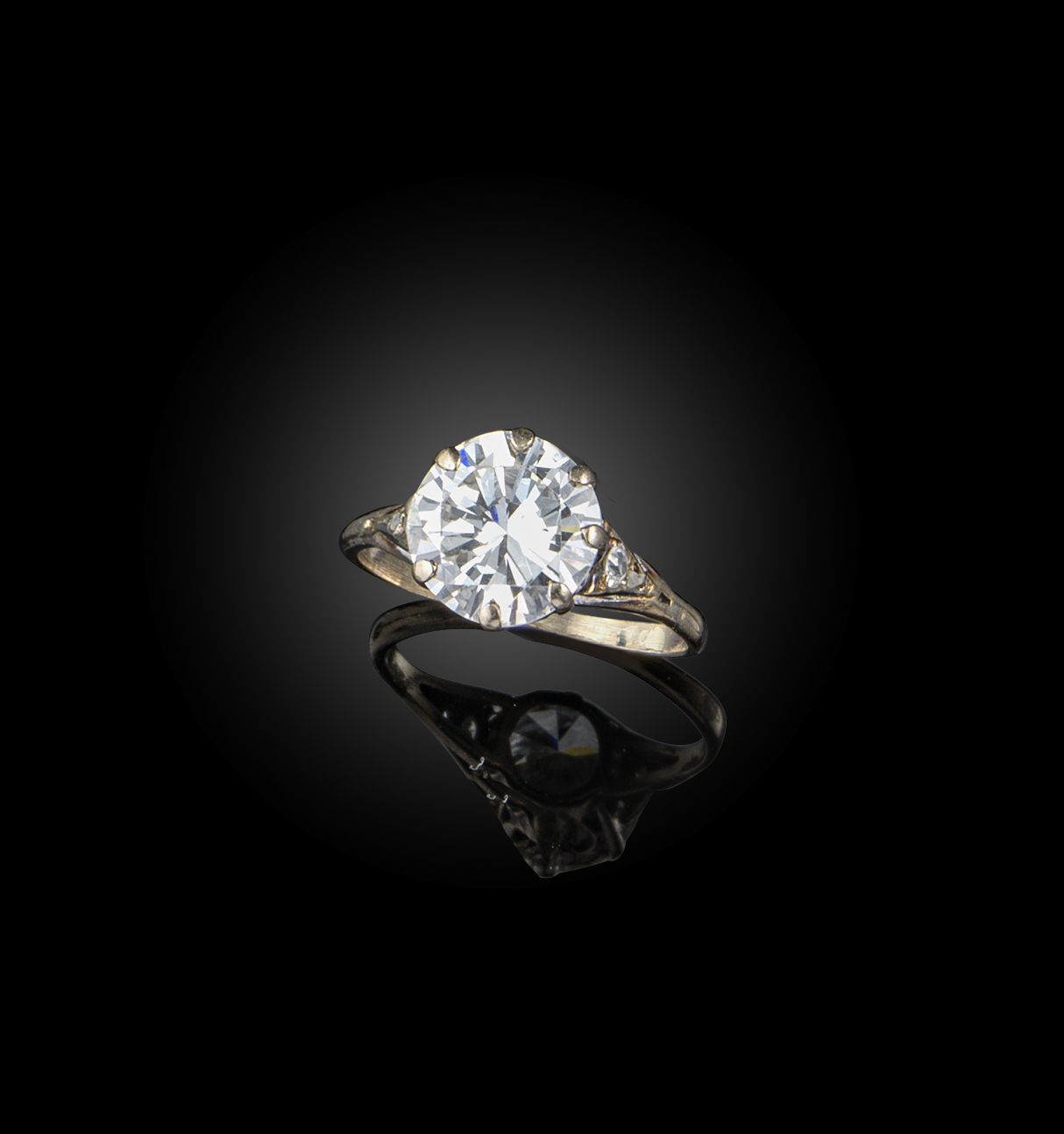 A diamond solitaire ring, the circular-cut diamond weighing 2.13cts, with diamond