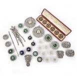 A large group of paste jewels, 19th and early 20th century, comprising: three brooches and a button,