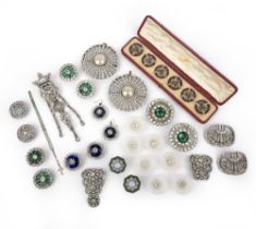 A large group of paste jewels, 19th and early 20th century, comprising: three brooches and a button,