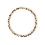 A gold necklace, composed of bicoloured chain linking, to a spherical clasp, length 47cm, Italian