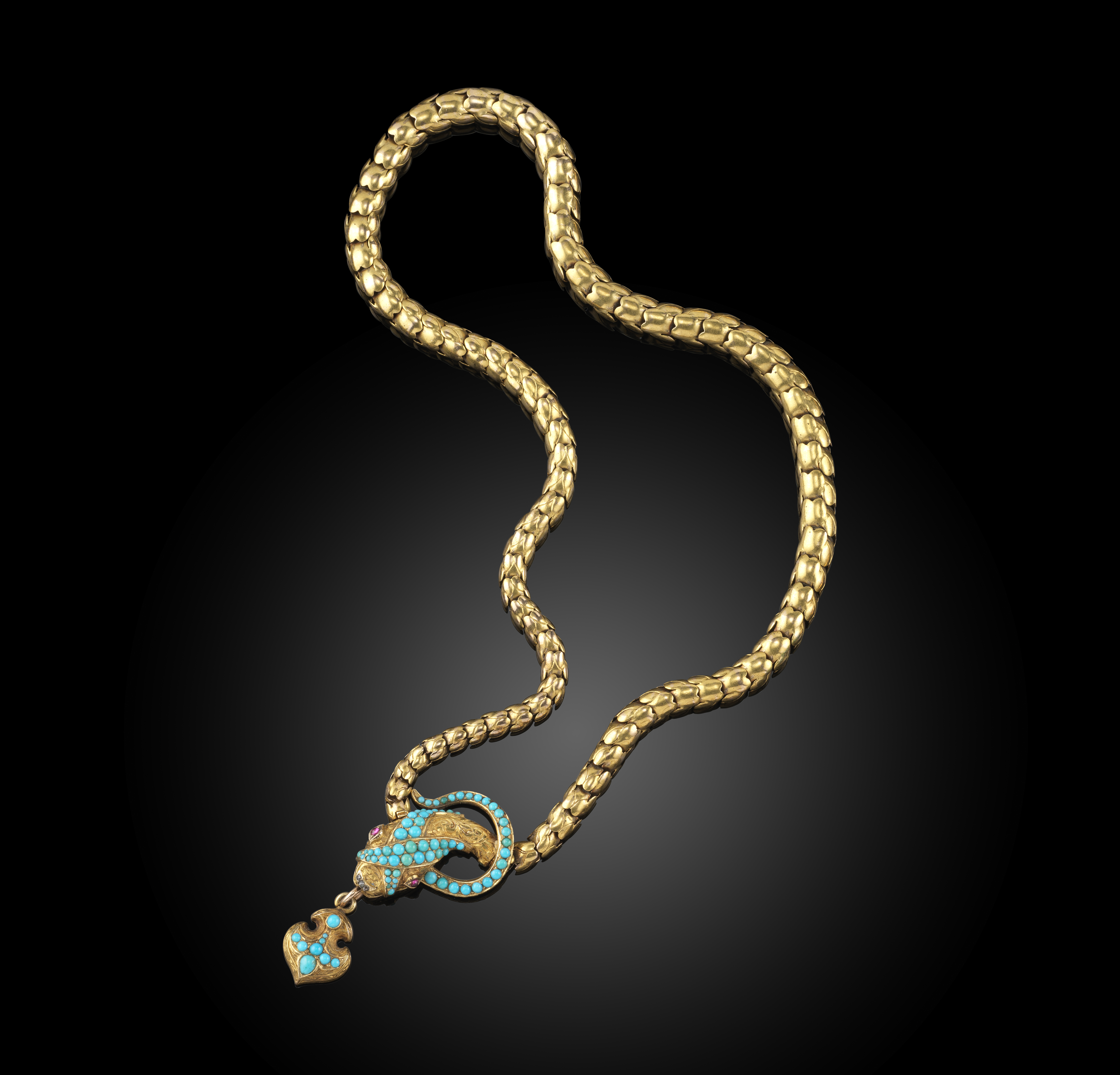 A Victorian gem-set gold snake necklace, mid 19th century, the realistically formed serpent with