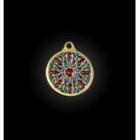 A gold and enamel pendant, early 20th century, designed as a rose window in stained glass, the
