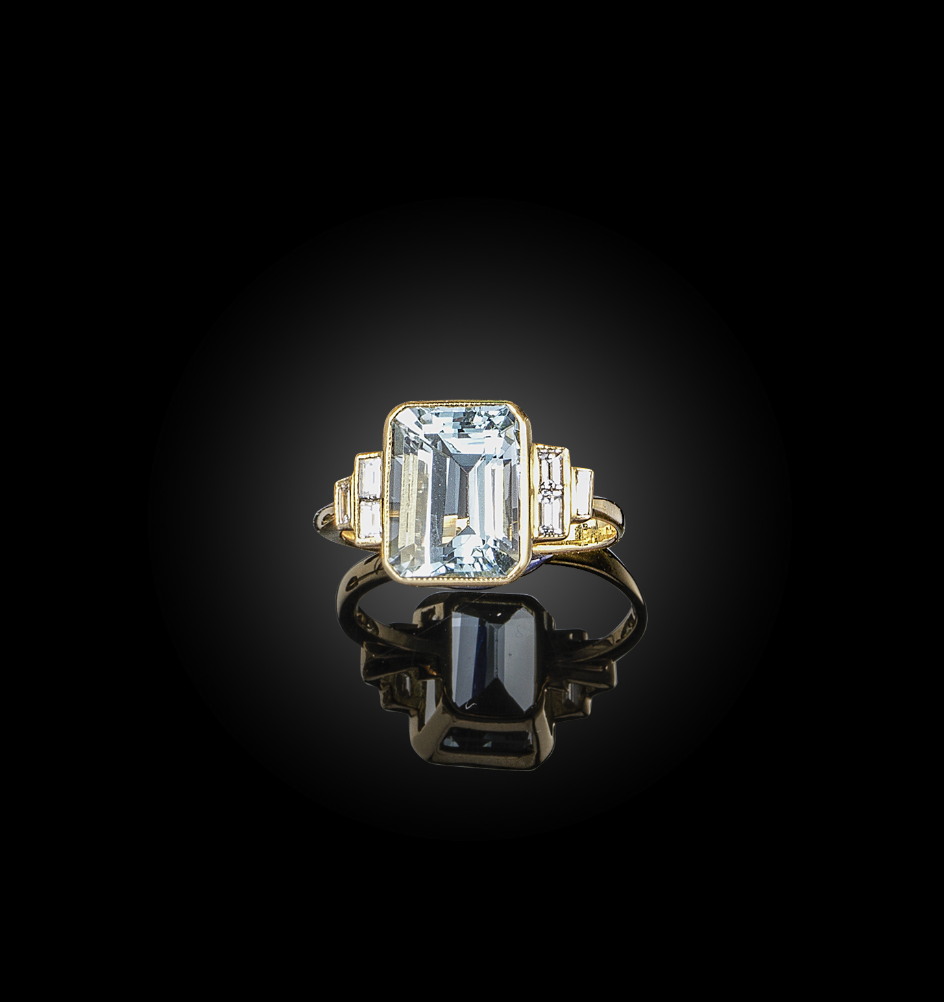 An aquamarine and diamond ring, the step-cut aquamarine with baguette-shaped diamond shoulders in